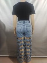 Hollow high waist straight pants $35.00